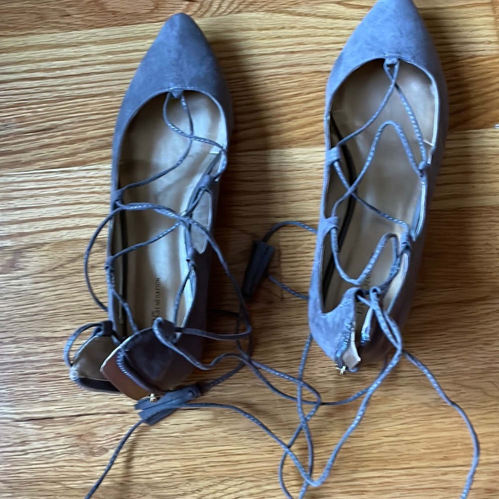 Slight worn lace up pointy shoes